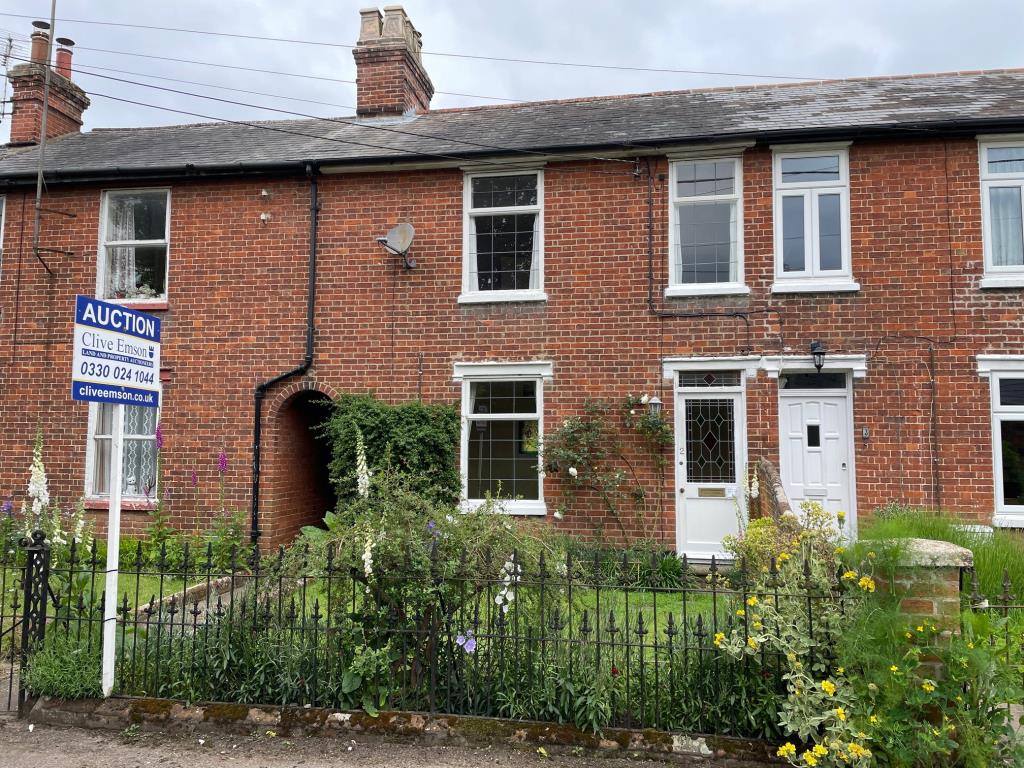 Lot: 134 - THREE-BEDROOM COTTAGE FOR IMPROVEMENT - Alternative view of the front of the property